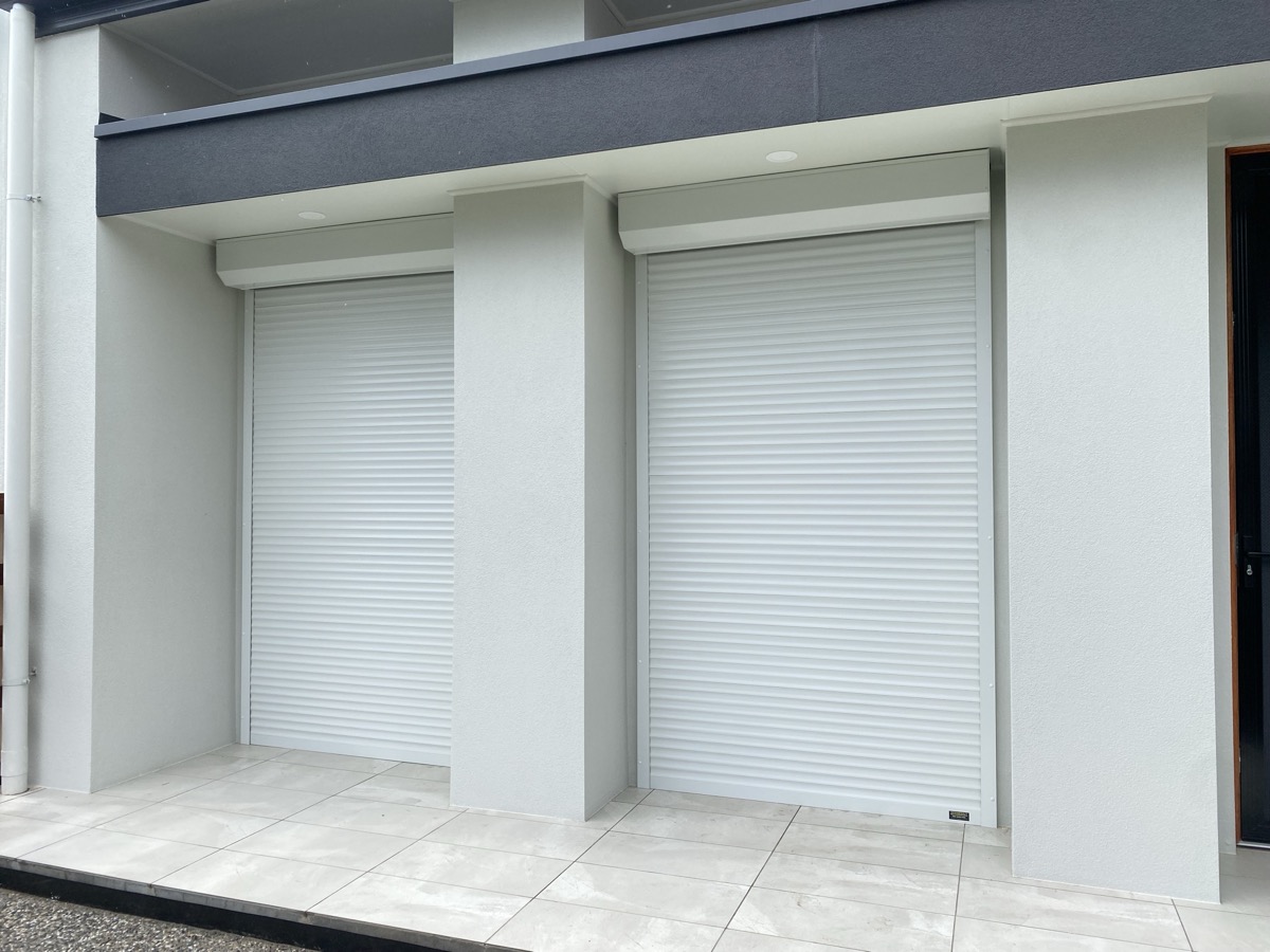 White roller shutters modern building