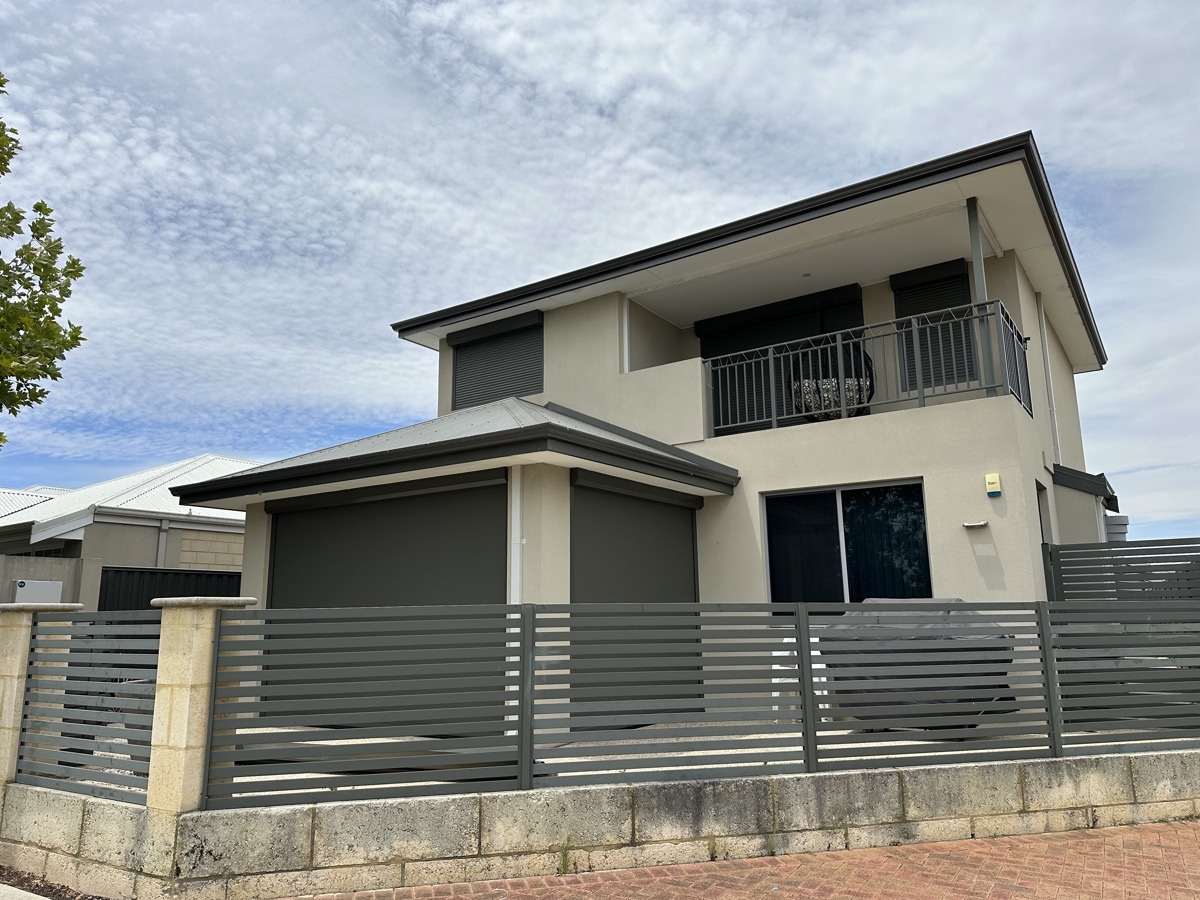 Grey roller shutters modern two-storey