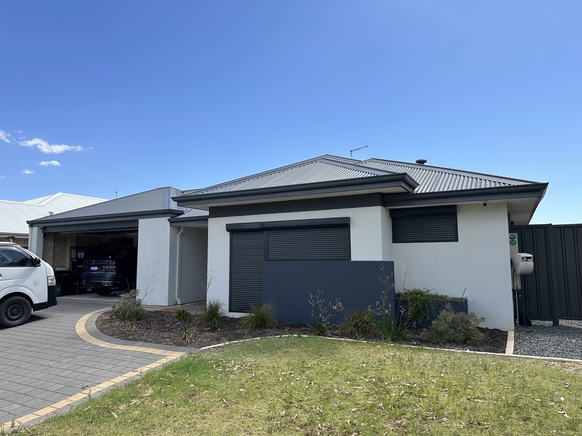 Roller shutters modern grey house